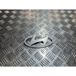 EMBLEMAT LOGO PRZÓD HYUNDAI KONA II SX2 23-